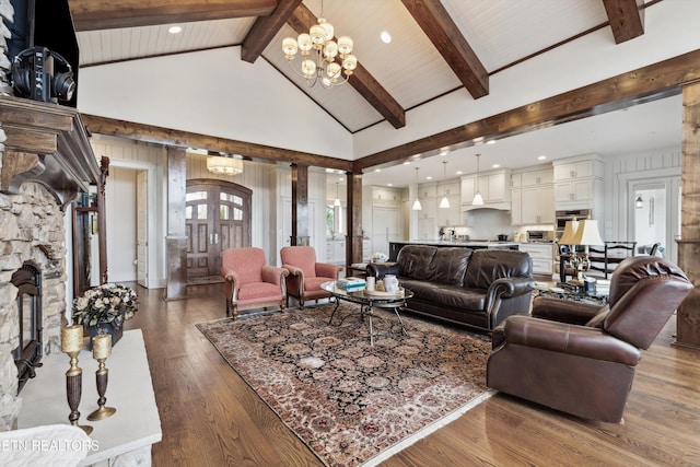 950 White Wing Rd, Lenoir City, TN 37771 - living area with french doors, high vaulted ceiling, a chandelier, beam ceiling, and wood finished floors