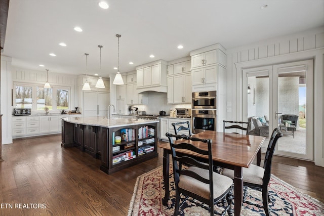 950 White Wing Rd, Lenoir City, TN 37771 - dining area featuring dark wood-style floors, recessed lighting, and a toaster