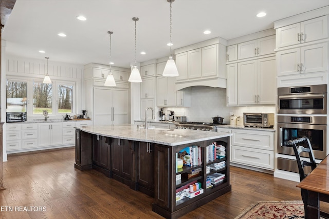 950 White Wing Rd, Lenoir City, TN 37771 - kitchen featuring appliances with stainless steel finishes, a toaster, white cabinetry, and a sink