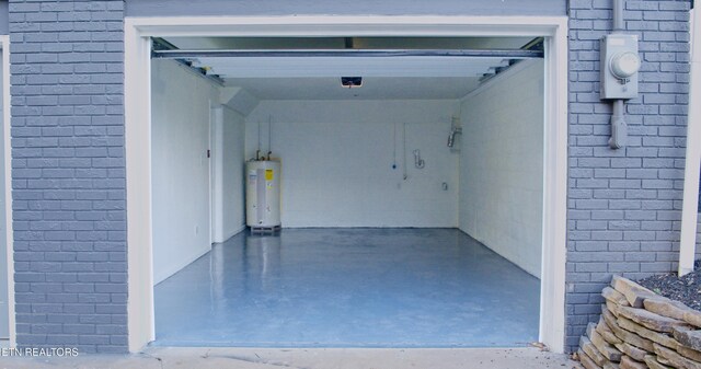 garage featuring electric water heater