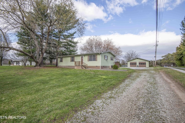 view of front of house with an outdoor structure, driveway, crawl space, a front lawn, and a garage