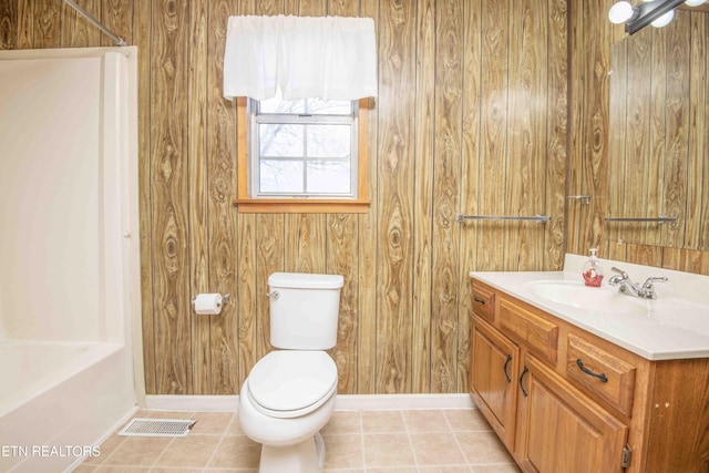 bathroom featuring tile patterned floors, visible vents, toilet, and vanity