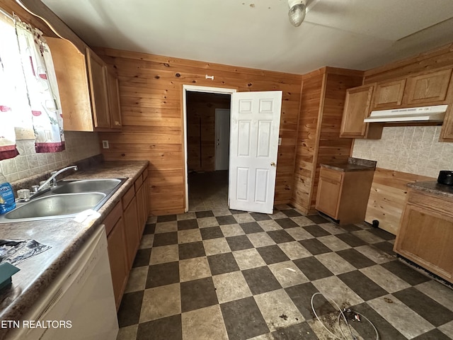 921 Winchester Ave, Middlesboro, KY 40965 - kitchen featuring a sink, wood walls, under cabinet range hood, dishwasher, and dark floors