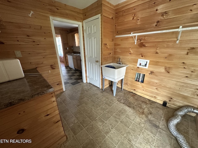921 Winchester Ave, Middlesboro, KY 40965 - laundry room featuring cabinet space, washer hookup, wood walls, and dark floors