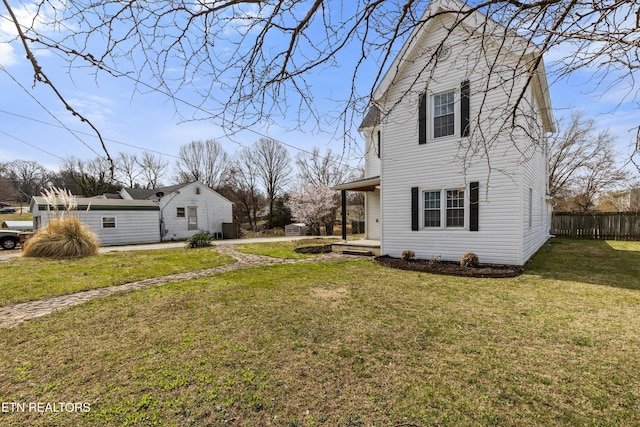 view of yard featuring fence