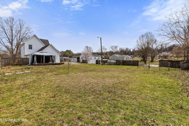 view of yard featuring a gazebo and fence