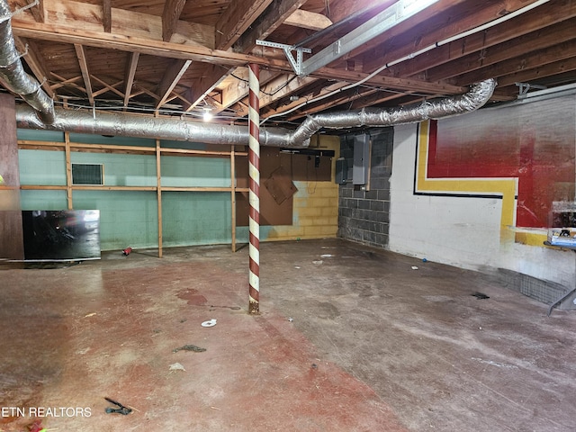 102 E Hutchinson Cir, Oak Ridge, TN 37830 - unfinished below grade area featuring concrete block wall and electric panel