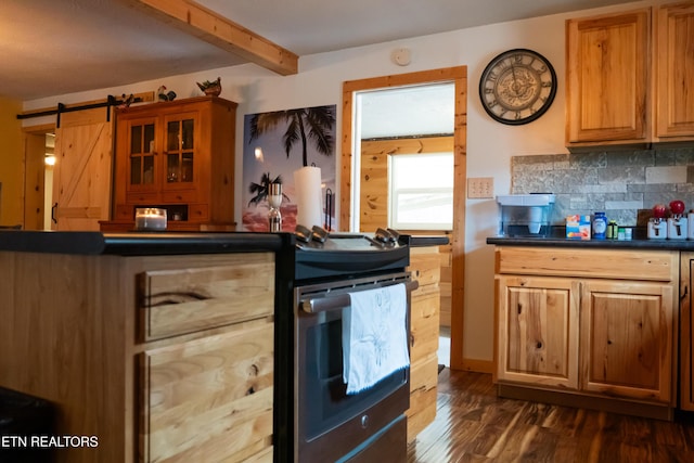 4662 Baker Hwy, Huntsville, TN 37756 - kitchen featuring a barn door, dark wood-type flooring, dark countertops, beamed ceiling, and tasteful backsplash