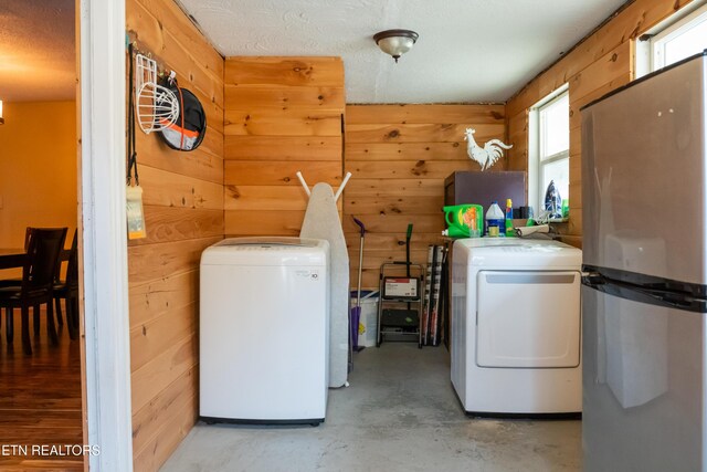4662 Baker Hwy, Huntsville, TN 37756 - laundry room with washing machine and dryer and wood walls