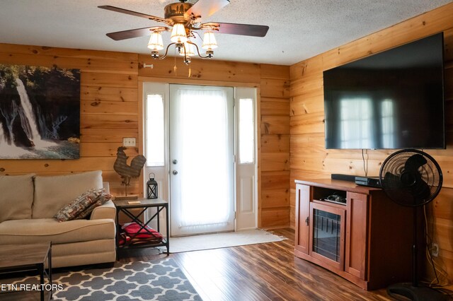 4662 Baker Hwy, Huntsville, TN 37756 - interior space with wood finished floors, wooden walls, a ceiling fan, and a textured ceiling