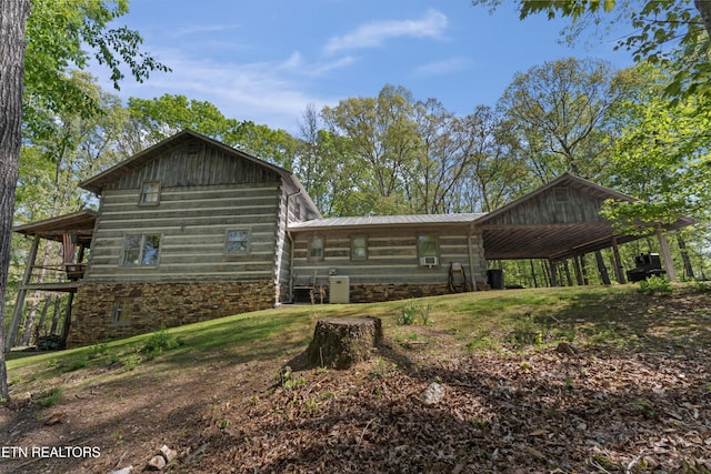 view of home's exterior featuring metal roof