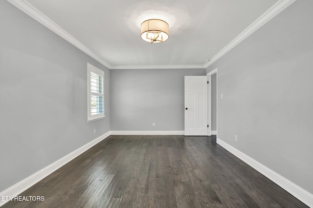 empty room with crown molding, baseboards, and dark wood-style flooring