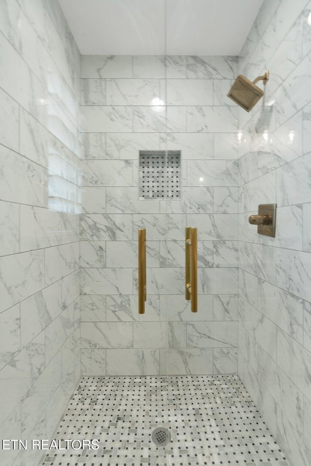 full bathroom with a stall shower