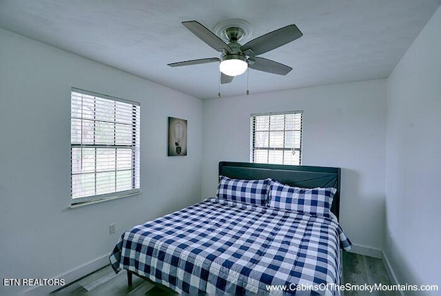 2218 Red Bank Cir, Sevierville, TN 37862 - bedroom with wood finished floors, baseboards, and ceiling fan