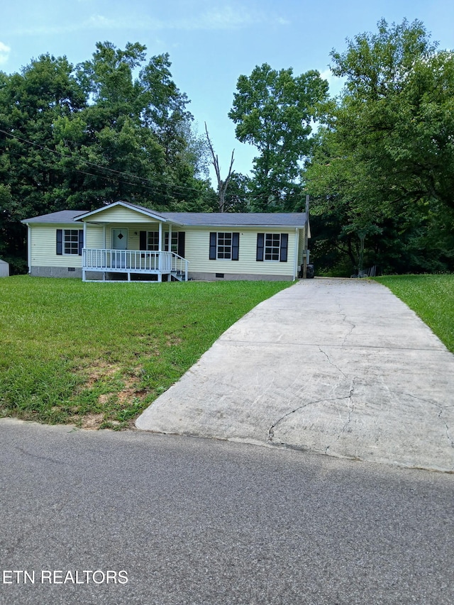 1432 Hammerhill Rd, Athens, TN 37303 - view of front of property with crawl space, a porch, driveway, and a front lawn