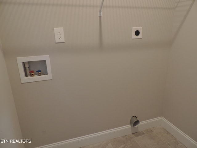 laundry area featuring electric dryer hookup, baseboards, hookup for a washing machine, and laundry area
