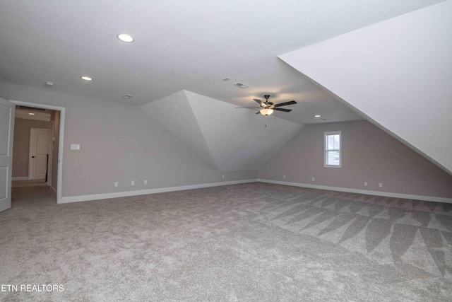 additional living space featuring visible vents, baseboards, ceiling fan, carpet floors, and recessed lighting