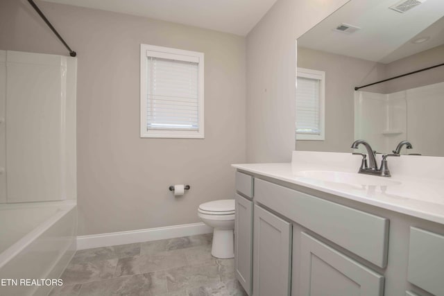 bathroom featuring visible vents, baseboards, toilet, shower / bathing tub combination, and vanity