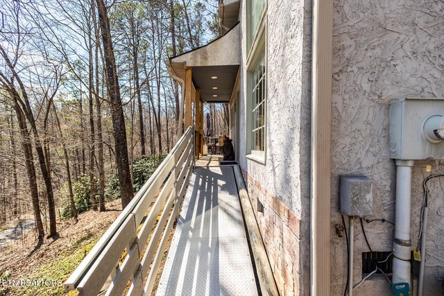 1027 N Highland Dr, Gatlinburg, TN 37738 - exterior space featuring electric meter and stucco siding