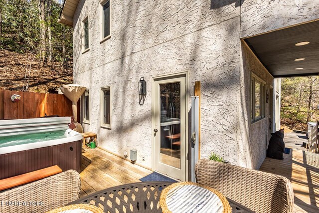 1027 N Highland Dr, Gatlinburg, TN 37738 - wooden deck with fence and a hot tub