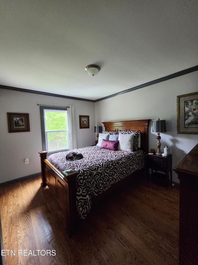 3009 Sanders Dr, Knoxville, TN 37918 - bedroom featuring baseboards, ornamental molding, and wood finished floors