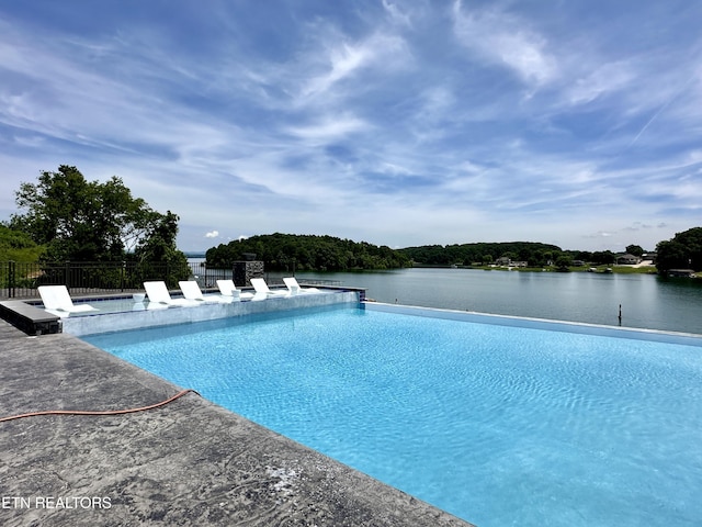 179 Lakeshore Bay Dr, Jefferson City, TN 37760 - view of swimming pool with a patio area, a water view, a fenced in pool, and fence