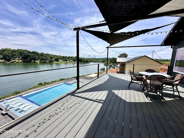 179 Lakeshore Bay Dr, Jefferson City, TN 37760 - wooden terrace featuring an outdoor pool, a water view, and outdoor dining space