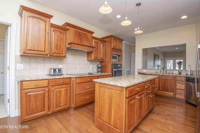 107 Sunny St, Sharps Chapel, TN 37866 - kitchen with black appliances, light wood-style floors, tasteful backsplash, recessed lighting, and crown molding
