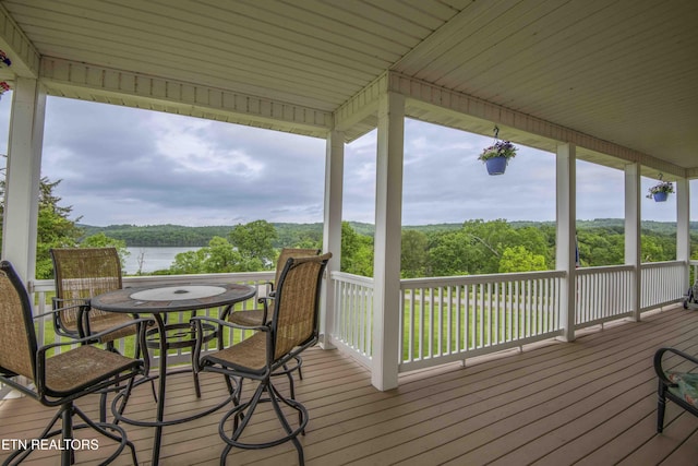 107 Sunny St, Sharps Chapel, TN 37866 - deck with a water view, outdoor dining area, and a wooded view