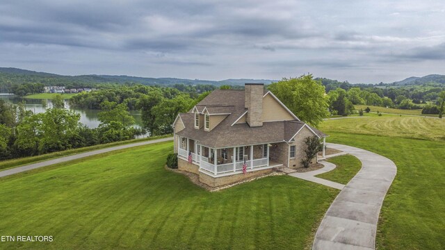 107 Sunny St, Sharps Chapel, TN 37866 - view of front facade featuring a porch, a chimney, a water view, and a front yard