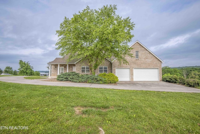107 Sunny St, Sharps Chapel, TN 37866 - view of front of property with brick siding, concrete driveway, and a front lawn
