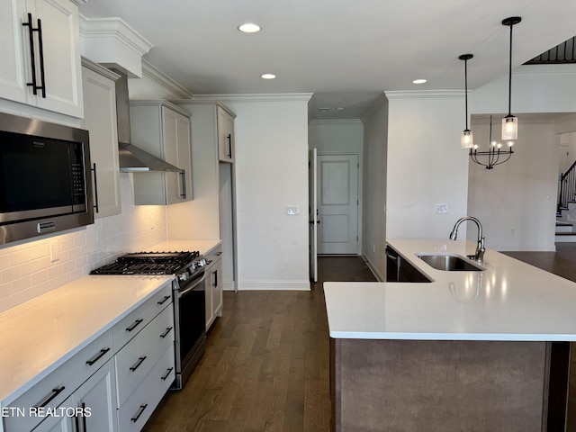 kitchen with decorative backsplash, light countertops, appliances with stainless steel finishes, dark wood-type flooring, and a sink