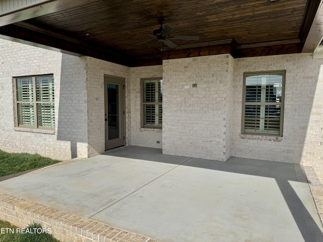 view of patio featuring a ceiling fan