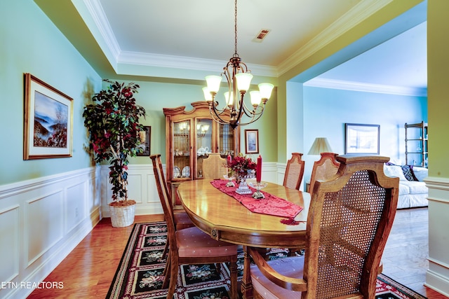 1120 Treymour Way, Knoxville, TN 37922 - dining area featuring a notable chandelier, visible vents, light wood finished floors, and ornamental molding