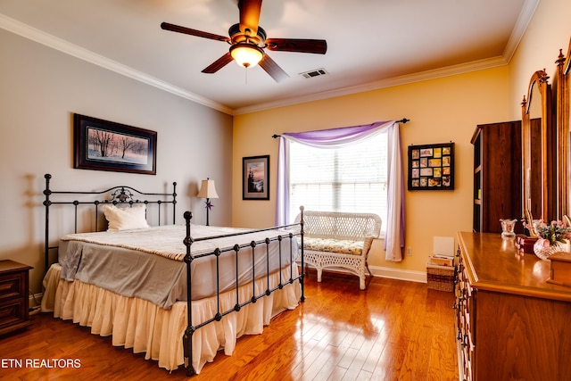 1120 Treymour Way, Knoxville, TN 37922 - bedroom featuring visible vents, ornamental molding, a ceiling fan, wood-type flooring, and baseboards