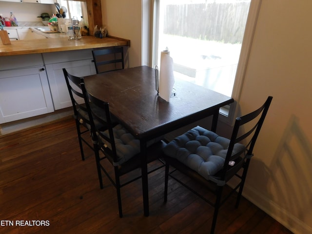dining room with dark wood-style floors