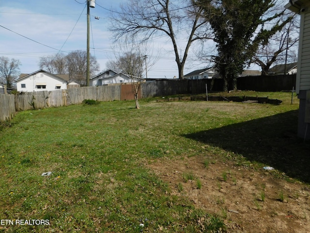 view of yard featuring a fenced backyard