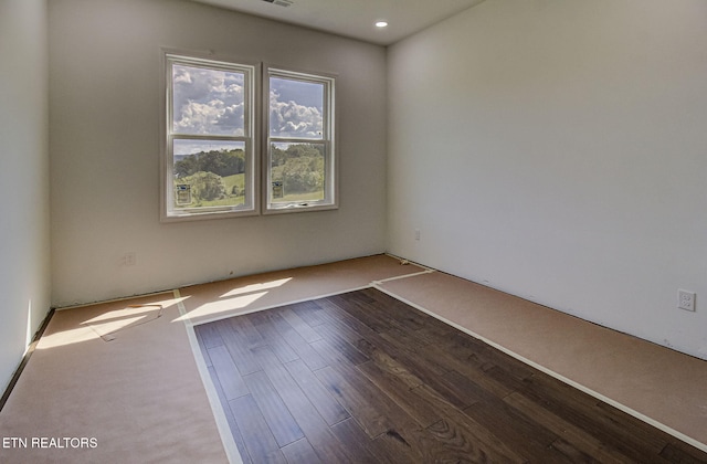 736 Cow Poke Ln, Rutledge, TN 37861 - unfurnished room with visible vents and wood finished floors