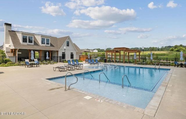 423 Ivey Farms Ln, Farragut, TN 37934 - community pool with fence, a pergola, and a patio area