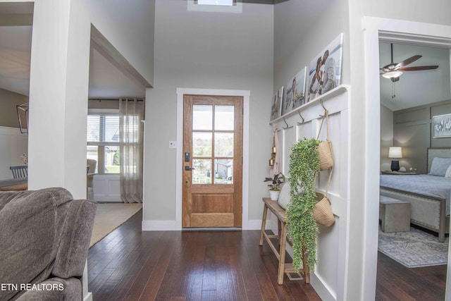 1312 Fox Ridge Dr, Powell, TN 37849 - entryway with hardwood / wood-style flooring, a ceiling fan, baseboards, and a towering ceiling