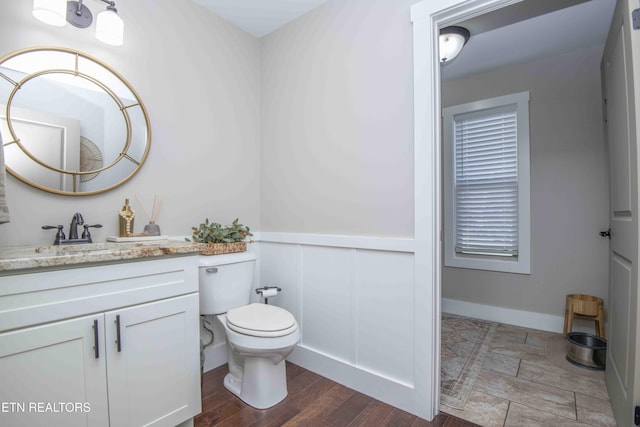 1312 Fox Ridge Dr, Powell, TN 37849 - bathroom featuring toilet, vanity, and baseboards