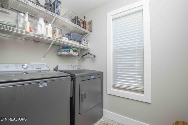 1312 Fox Ridge Dr, Powell, TN 37849 - washroom with baseboards, washing machine and dryer, and laundry area