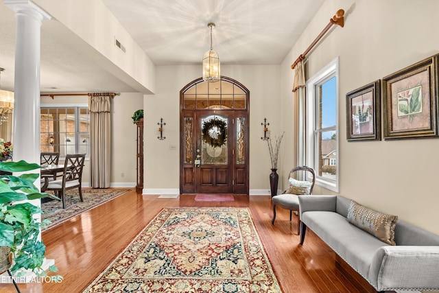 725 Wood Duck Dr, Vonore, TN 37885 - entryway featuring a chandelier, wood finished floors, and healthy amount of natural light
