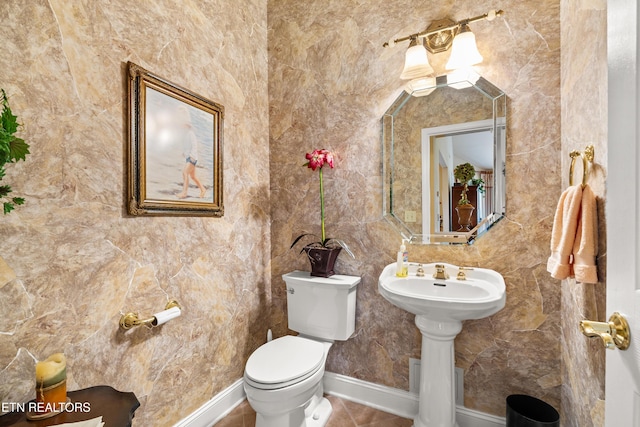 725 Wood Duck Dr, Vonore, TN 37885 - half bathroom with toilet, tile patterned floors, tile walls, and a sink