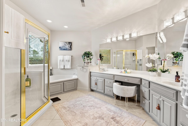 725 Wood Duck Dr, Vonore, TN 37885 - full bathroom with a shower stall, double vanity, tile patterned flooring, a bath, and recessed lighting
