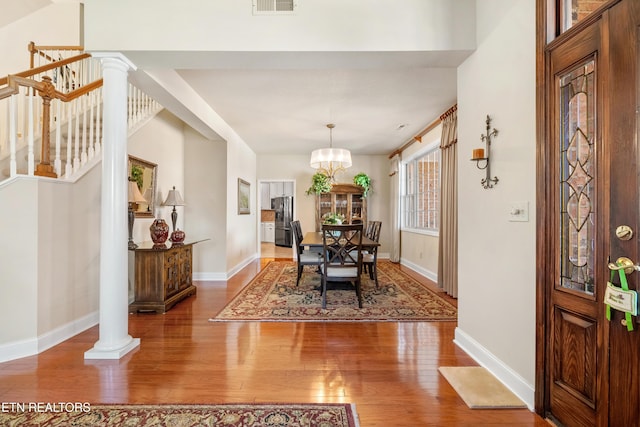 725 Wood Duck Dr, Vonore, TN 37885 - entrance foyer with light wood-style floors, baseboards, and a chandelier
