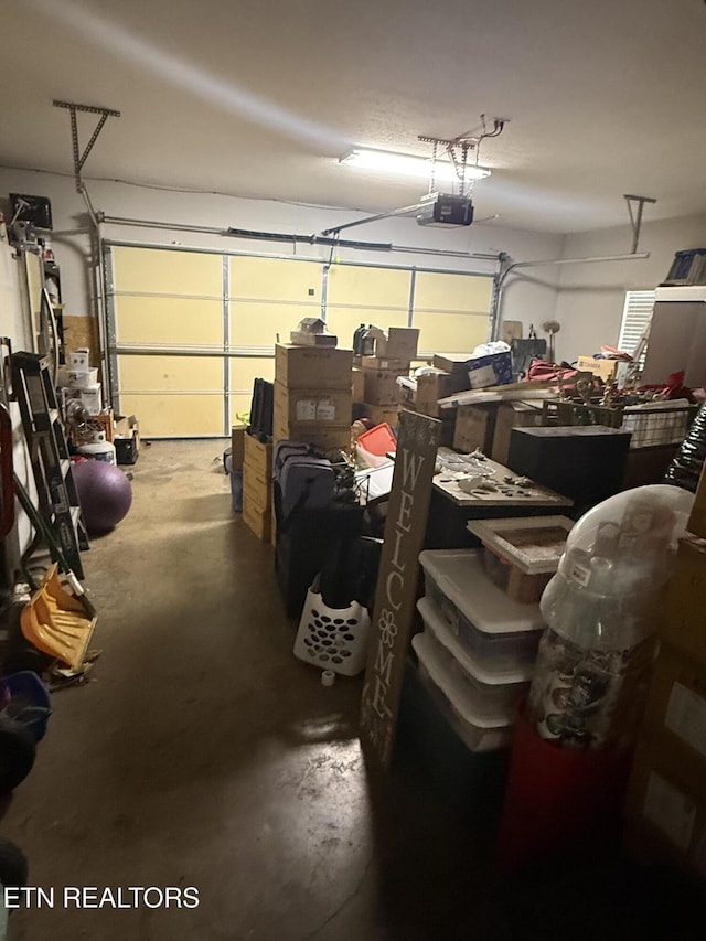 garage featuring a garage door opener