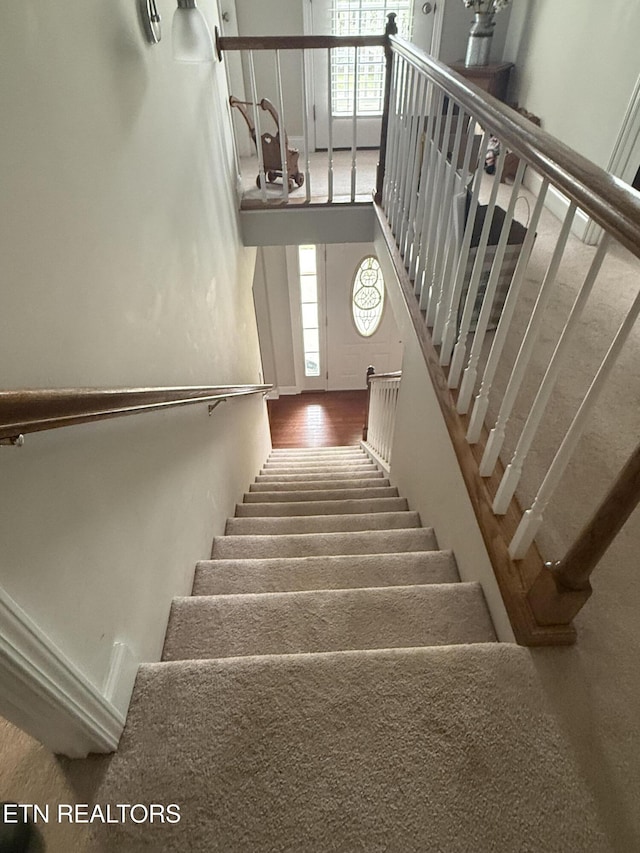 stairs with a wealth of natural light