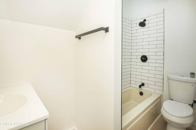 full bath with vanity, shower / tub combination, lofted ceiling, and toilet