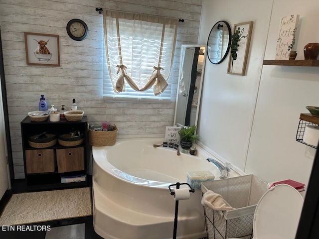 145 Liles Ln, Rocky Top, TN 37769 - full bathroom featuring wood walls and a bath